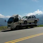 La imagen 1 de la Empresa BM GRÚAS Transportista de automóviles en Villavicencio MET